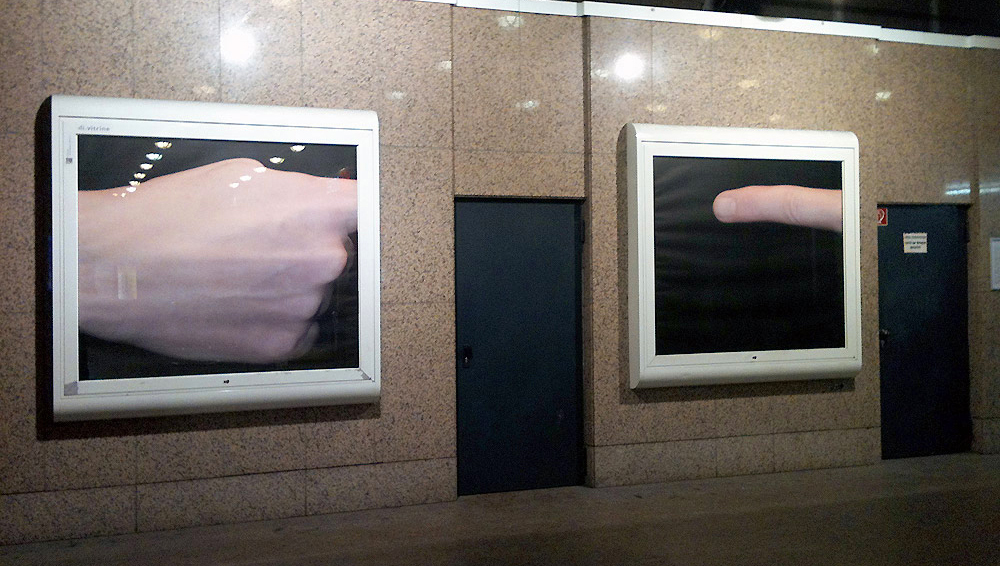 Art, artwork. An intervention in public space by Nika Span / Nika Špan. Two laminated prints, 150 x 180 cm each. di.vitrine, Railway station Bilker-Bahnhof, Duesseldorf, Germany
