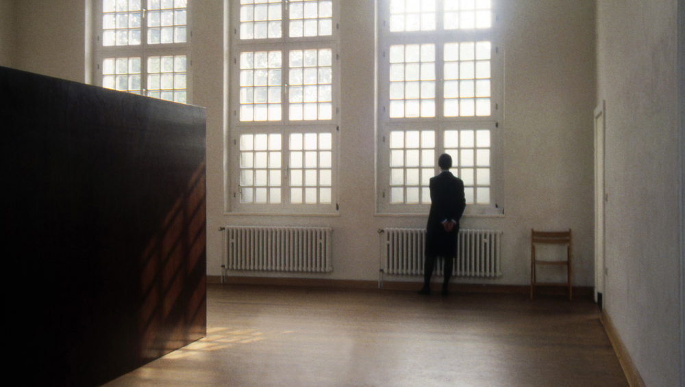 Art, artwork. A performance Ready-made entitled "Waiting Room" by Nika Span / Nika Špan. Material: A guard’s uniform with a label. Exhibition: Eller-Bahnhof 1, Eller Railway station, Duesseldorf, Germany.